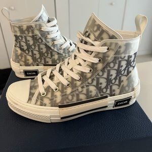 Dior logo high top sneakers.